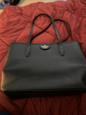 kate spade black leather tote with logo plaque